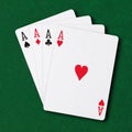 Four Aces on green card table poker winning hand business concept Royalty Free Stock Photo