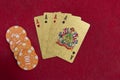 Four aces near stacks of chips on a red felt table Royalty Free Stock Photo