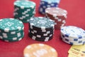 Four of aces near stacks of chips on a red felt table Royalty Free Stock Photo