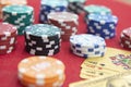 Four aces near stacks of chips on a red felt table Royalty Free Stock Photo