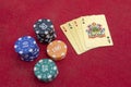 Four aces near stacks of chips on a red felt table Royalty Free Stock Photo