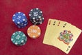 Four aces near stacks of chips on a red felt table Royalty Free Stock Photo