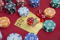 Four of aces near stacks of chips on a red felt table