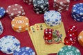 Four of aces near stacks of chips on a red felt table Royalty Free Stock Photo