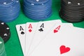 Four aces and poker stacked chips Royalty Free Stock Photo