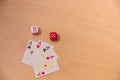 Four aces and two dice with red and white hearts Royalty Free Stock Photo