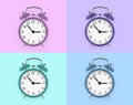 Four alarm clocks with different colors