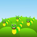 Four amusing caterpillars on a green lawn