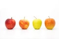 Four apples in a row with three red apples Royalty Free Stock Photo