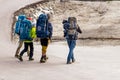 Four backpackers walking in Sisimiut, Greenland.