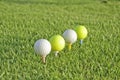 Four balls of golf. Royalty Free Stock Photo