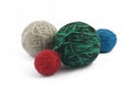 Four balls of wool on white background Royalty Free Stock Photo