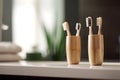 Four bamboo toothbrushes in a cups on the table in modern bathroom. Family healthcare concept. Generative AI