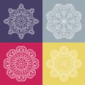 Four beautiful circular ornament on a colored background. Mandala. Stylized flowers. Vintage decorative elements. Royalty Free Stock Photo