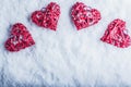 Four beautiful romantic vintage hearts on a white frosty snow background. Love and St. Valentines Day concept.