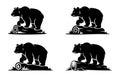 Four Black Bear Silhouettes Standing on Logs with Grass Royalty Free Stock Photo