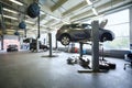 Four black cars in garage with special equipment