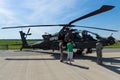 A four-blade, twin-engine attack helicopter Boeing AH-64 Apache Longbow.