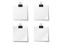 Four blank notes with clips isolated on white background Royalty Free Stock Photo