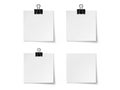 Four blank notes with clips isolated on white background Royalty Free Stock Photo