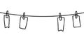 Four blank tags hanging on a clothesline string Royalty Free Stock Photo