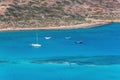 Four boats in lagoon of Balos. Crete. Greece.