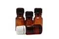Four bottles of aromatherapy oils isolated Royalty Free Stock Photo