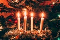 Four burning advent candles background Royalty Free Stock Photo