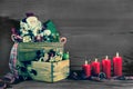 Four burning christmas candles with santa for christmas decoration. Royalty Free Stock Photo