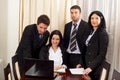 Four business people working Royalty Free Stock Photo