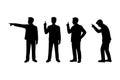Four Businessmen Silhouettes Gesturing in Different Directions Royalty Free Stock Photo