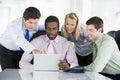 Four businesspeople in a boardroom Royalty Free Stock Photo