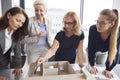 Four businesswomen working in the office