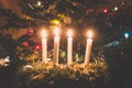 Four burning advent candles background Royalty Free Stock Photo