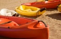 Four canoes on sand