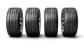 Four car tires isolated on white created with Generative AI. Wheels in black with grooves. Royalty Free Stock Photo