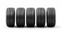Four car tires isolated on white created with Generative AI. Wheels in black with grooves. Royalty Free Stock Photo