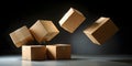 Four cardboard boxes falling against a black background Royalty Free Stock Photo