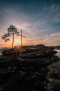 Four castles view, RÃÂ¶tzenfels, a sandstone rock with a cross and a tree. Sunrise, fog, Palatinate Forest, Germany. landscape shot Royalty Free Stock Photo