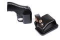 Four-charging traumatic gun and leather holster on a white background. Royalty Free Stock Photo