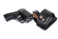 Four-charging traumatic gun and leather holster on a white background. Royalty Free Stock Photo