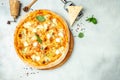 Four cheese pizza on a light background, Restaurant menu, dieting, cookbook recipe top view