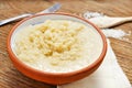 Four cheese risotto on a wooden table