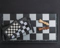 Four chessboards of different sizes lying on top of each other