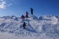 Four Children On Top of a Huge Snow Drift