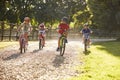 Four Children On Cycle Ride In Countryside Together Royalty Free Stock Photo