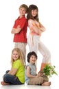 Four children with flowers Royalty Free Stock Photo