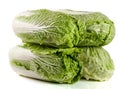 Four chinese cabbage and half on white background