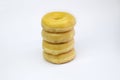 Four Classic Donuts Stack on White Background