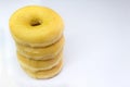 Four Classic Donuts Stack on White Background